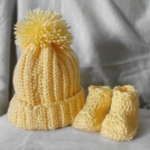Handmade baby hat and booties set
